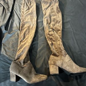 Thigh high boots with draw string.